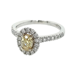 Platinum & 18ct Yellow Gold Oval Yellow Diamond Halo Ring