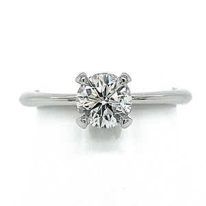 Platinum Engagement Ring with round brilliant cut centre stone in a four claw setting