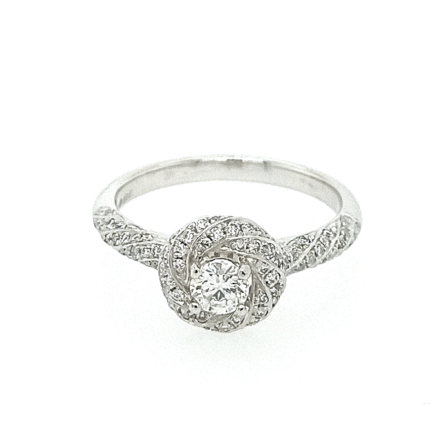 Platinum Brilliant-Cut Diamond Ring with a Twist Pave Diamond Setting