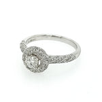Platinum Brilliant-Cut Diamond Ring with a Twist Pave Diamond Setting