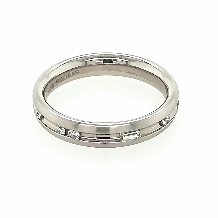 Platinum and White Gold Channel Set Diamond Ring